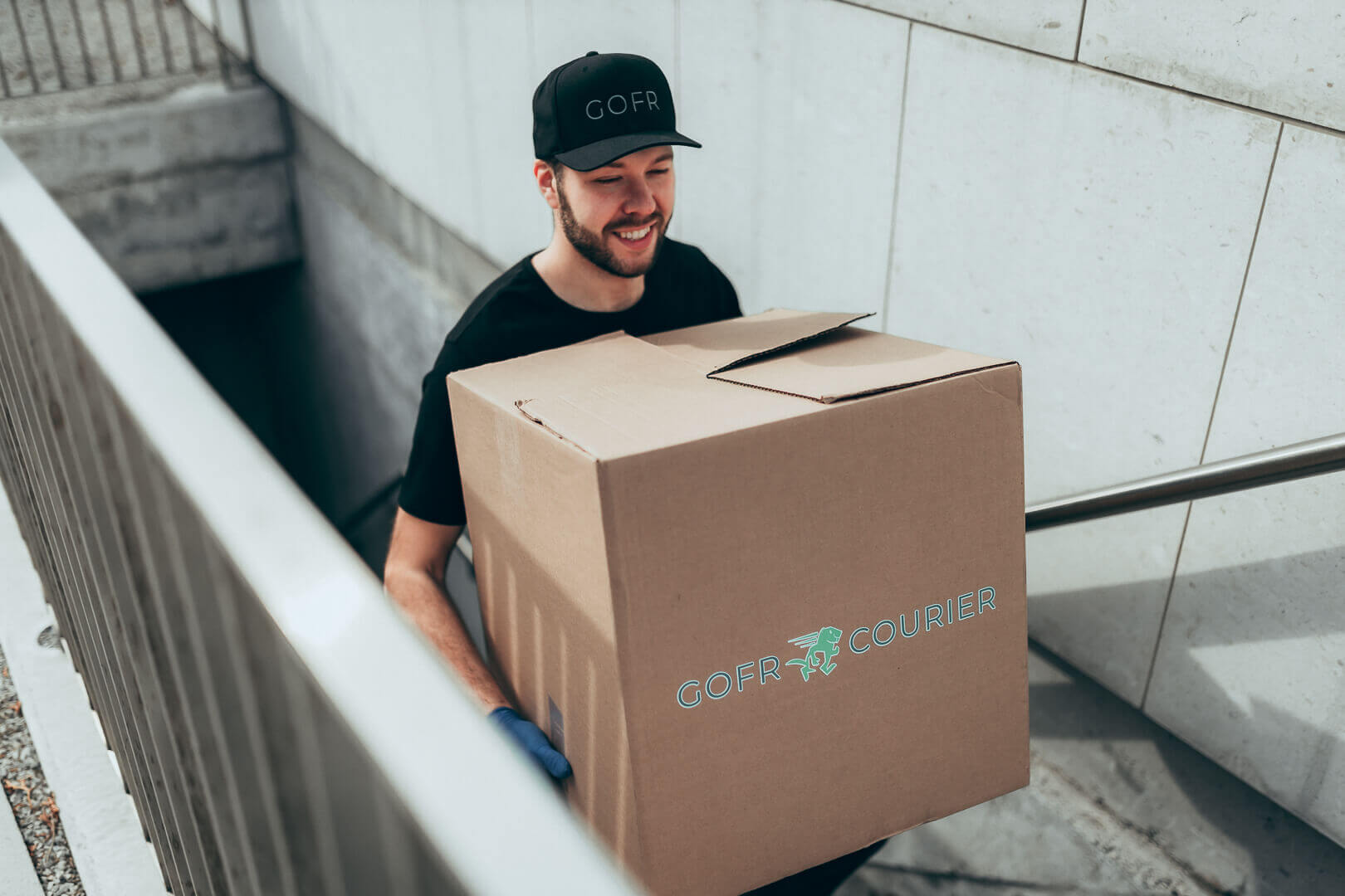 contactless package pick-up by gofr courier driver in toronto